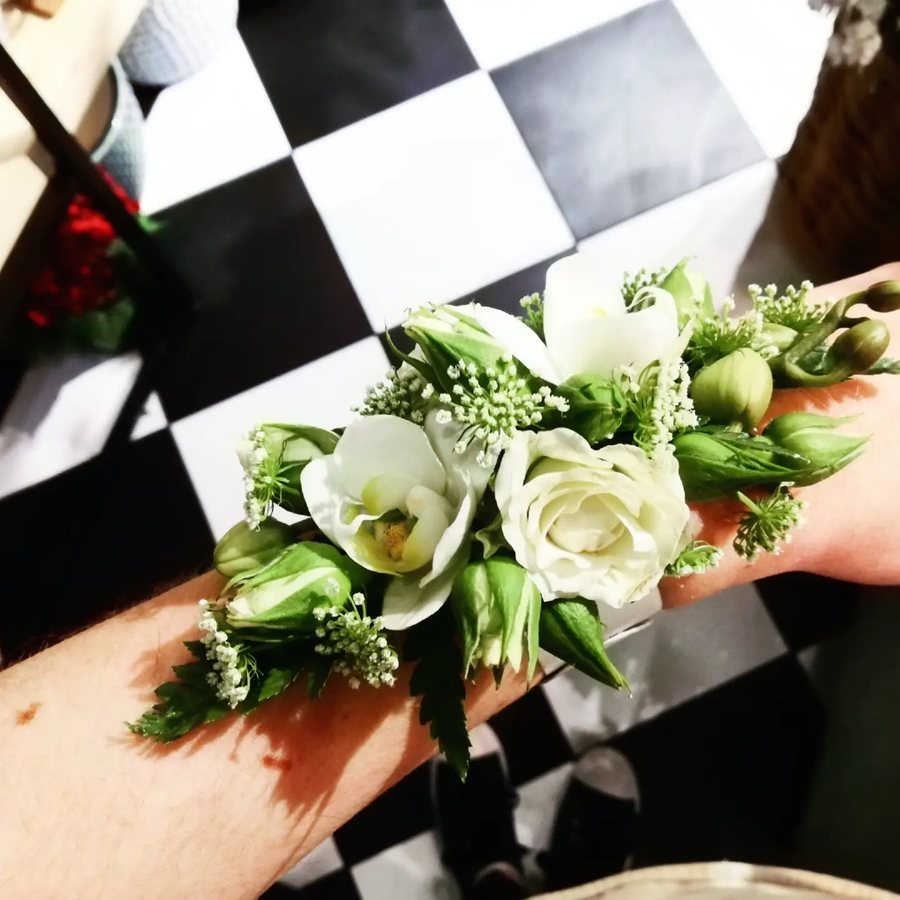White rose and lisianthus wrist corsage