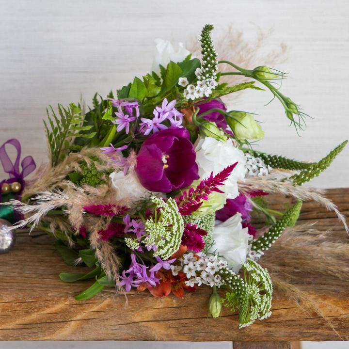 Hand-tied garden bouquet on a wooden table